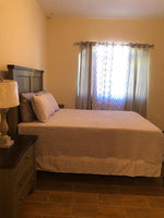Load image into Gallery viewer, Vacation Villas Runaway Bay 2 Bedroom 2 Bathroom  Pool View
