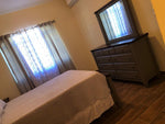 Load image into Gallery viewer, Vacation Villas Runaway Bay ,1 Bedroom Suite with open Kitchen.
